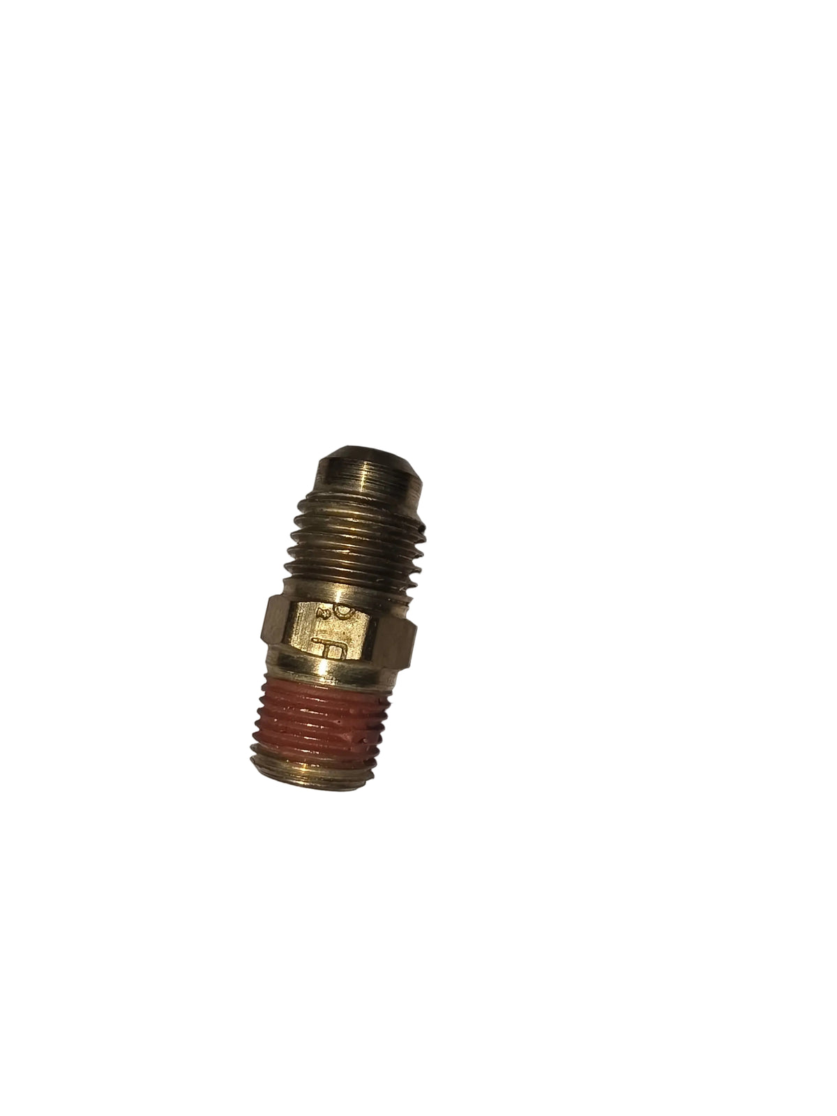 Brass plumbing fitting on a gray background