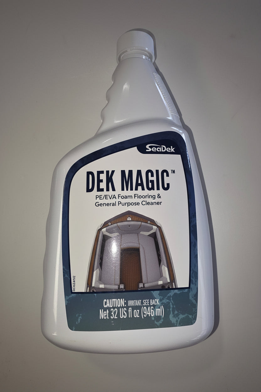 A bottle of SeaDek DEK MAGIC PE/EVA Foam Flooring and General Purpose Cleaner, 32 fl oz, shown against a plain light gray background.