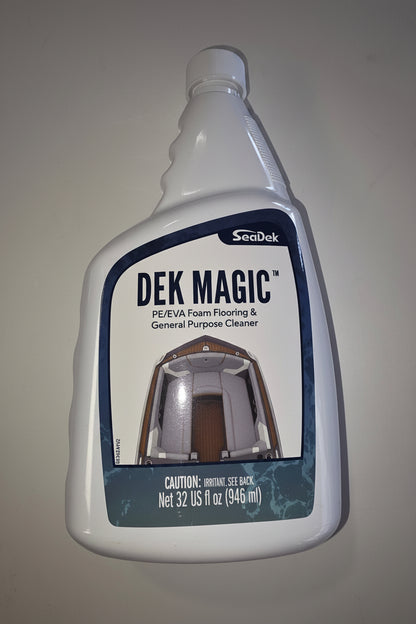 A bottle of SeaDek DEK MAGIC PE/EVA Foam Flooring and General Purpose Cleaner, 32 fl oz, shown against a plain light gray background.