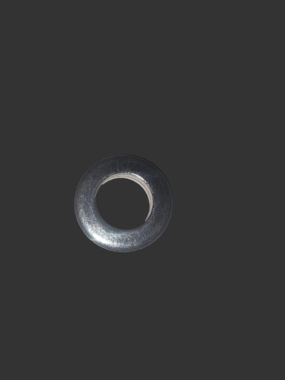 Metal washer on a gray background