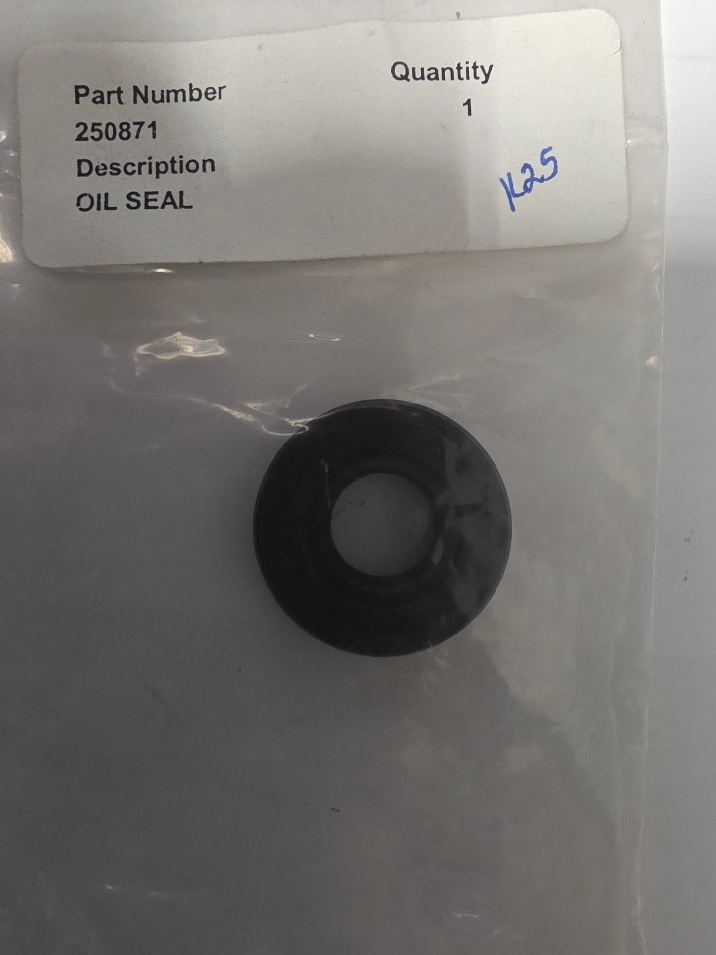 Black oil seal on a white background with a label indicating part number and description.