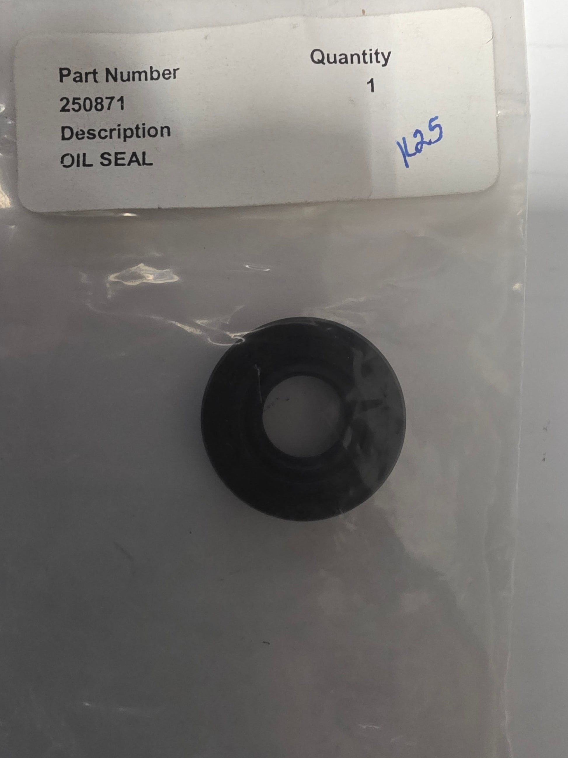 Black oil seal on a white background with a label indicating part number and description.